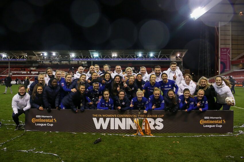 Chelsea players in blue kit during a match