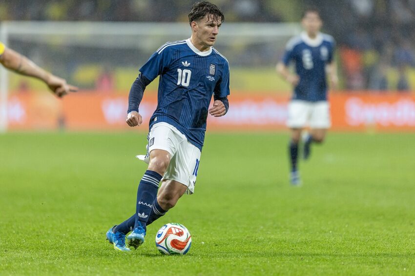 Christos Tzolis in action for Greece during an international match