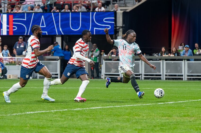 Jérémy Doku in Manchester City kit during pre-season