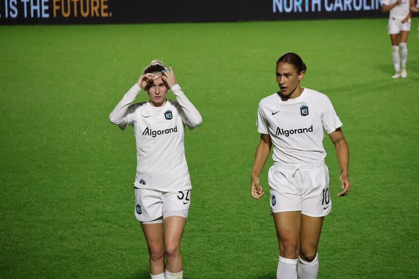 Jenna Nighswonger in action during a women's soccer match